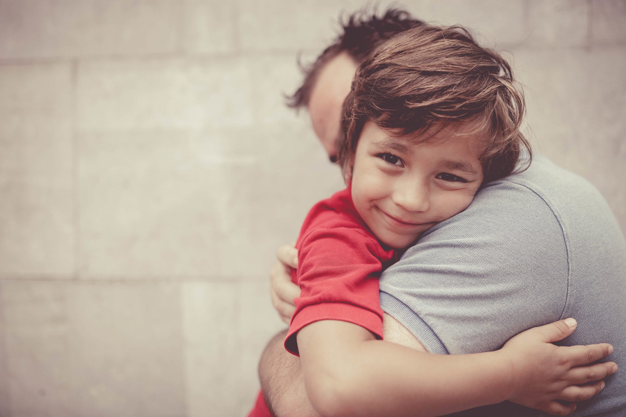 Little Boy Hugging His Dad Morrison Child Family Services